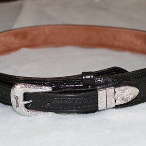 Nocana Belt Co. black leather belt with silver buckles. New. Size 32.